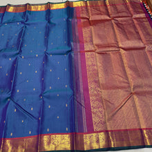Sahana- Stunning Peacock Blue with Rustic Orange Buttas Handwoven Pure Jari Kanjivaram Silk with beautiful borders with green selvedges rich pallu and contrast woven blouse