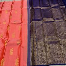 Saranga- Beautiful Peach with Navy Blue Borderless Handwoven Pure Jari Kanjivaram Silk with Muthukattam and Paisleys with peacock and annapakshi Buttas woven body with rich pallu and contrast navy blue blouse!