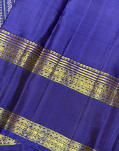 Sahana- Gorgeous Bronze Gold with Violetish Blue Handwoven Pure Jari Kanjivaram Silk with buttas woven body with doublepet borders with gorgeous meenakari woven pallu and contrast woven blouse