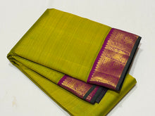 Sarasangi- Mesmerizing Sampanga Green with Vadamalli Purple Handwoven Pure Jari Korvai Kanjivaram Silk with beautiful Yazhis elephants and annapakshis woven rich borders gorgeous pallu and contrast woven blouse