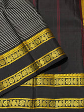 Saraswati- Stunning Deep beetlenut purplish brown handwoven pure zariless kanchipuram silk with striped body with rettapet green and yellow colors kamalam and paisley motifs woven beautiful borders classic seer pallu and contrast woven blouse