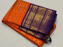 Vaibhogam- Stunning Orange with Purple Handwoven Pure Zari Korvai Kanjivaram Silk with Jari Veldhari woven body with beautiful Varisaipet borders rich pallu and contrast woven blouse