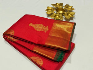 Red with Green Handwoven Pure Jari Kanjivaram Silk Saree with Buttas woven in muthukattam body with rich pallu and contrast Emerald Green Blouse beauty