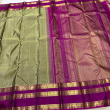 Sarasangi- Stunning Elaichi Green with Deep Magenta Buttas Handwoven Pure 2g Jari Korvai Kanjivaram Silk with beautiful doublepet borders rich woven pallu and contrast woven blouse