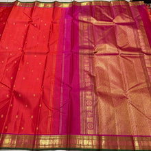 Sahana- Gorgeous Dual tone Orange with Pink Buttas with small borders Handwoven Pure Kanjivaram Silk with gorgeous pallu and contrast woven blouse