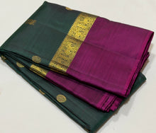 Sahana- Stunning Bottle Green with Dark Magenta Mayil Chakram Buttas Handwoven Pure 2g Jari Kanjivaram Silk with Spaced borders rich pallu and contrast woven blouse