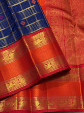 Vaibhogam-Gorgeous Deep Blue Orange Red Handwoven Pure Zari Kanijivaram Silk with rich jari checks and meena buttas woven beautiful body with rich borders pallu very intricately woven and contrast woven blouse