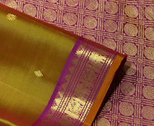 Sahana- Gorgeous Golden Double tone Sampanga mustard shot green tint with Purplish Pink Buttas Handwoven Pure Jari Kanjivaram Silk with Small intricate borders with orange selvedges rich pallu and contrast woven blouse