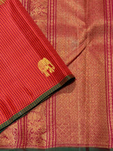 Saranga- Gorgeous Orange with Arakku Kasakasa Podikattam with Elephant motifs woven beautiful body with green selvedges rich pallu in arakku with very intricate weaving and contrast woven arakku blouse