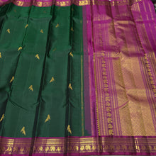 Sahana- Stunning Bottle Green with Deep Magenta Handwoven Pure Jari Rettaikili Buttas Handwoven Kanjivaram Silk with gorgeous Borders and Pallu woven with lot of details and contrast woven blouse