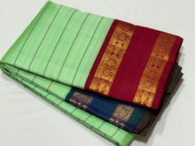 Vaibhogam-Gorgeous Korvai Veldhari in a beautiful pastel green with peacock blue and arakku Ganga Jamuna Borders Handwoven Pure Jari Kanjivaram Silk with rich pallu and contrast woven blouse beauty