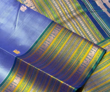 Saraswati- Powder Blue with Peacock Blue Handwoven Pure Zariless Premium Kanchipuram Silk with beautiful varisaipet borders rich pallu and contrast peacock blue blouse