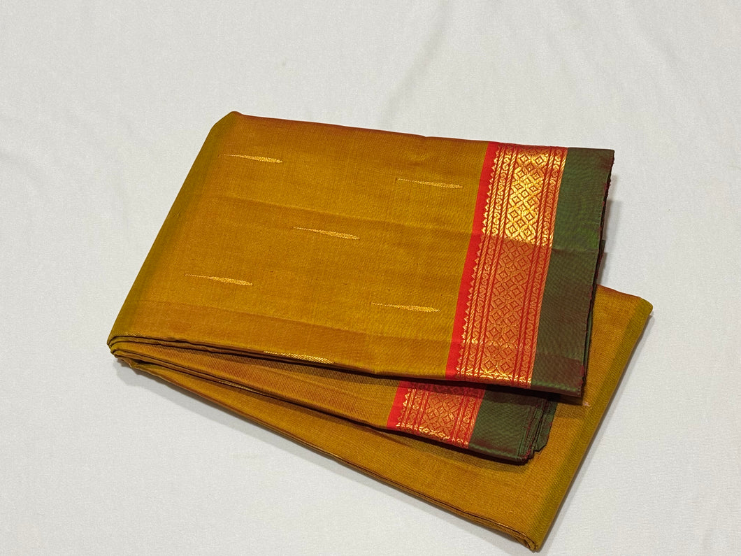 Golden Sampanga with Orange Mallimoggu Buttas Handwoven Pure Jari Kanjivaram Silk Saree Beauty