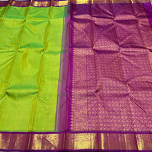 Vaibhogam-Mesmerizing Sneha Green with  purple handwoven pure Jari Korvai Kanjivaram silk with rich borders buttas woven body gorgeous pallu and contrast woven beautiful blouse