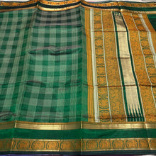 Deep Emerald Green with Gold Yazhi borders muthukattam checked Premium Handwoven Pure Kanjivaram Silkcotton Saree Beauty