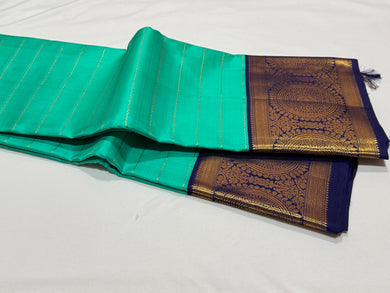 Turquoise Blue Green with Navy Blue Handwoven Pure Jari Korvai Beldhari Striped body with Tambalam butta woven borders Kanjivaram Silk saree beauty