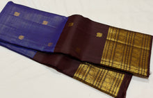 Vaibhogam- Gorgeous Ink Blue with Coffee Brown Vairaoosi with Buttas Handwoven Pure 2g Jari Kanjivaram Silk with beautiful small elephants and peacocks woven body and middle borderd and rich coffee brown borders pallu and contrast woven brown blouse
