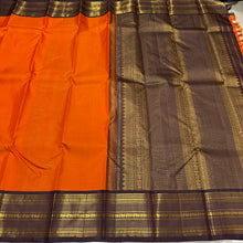 Vaibhogam- Strikingly beautiful Orange with Dark Beetlebut Brown Handwoven Pure2g Jari Korvai Kanjivaram Silk with beautiful Vairaoosi woven rich body with gorgeous varisaipet borders rich pallu and contrast woven beautiful blouse