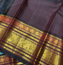 Vaibhogam- Stunning Turquoise Double tone Bluish Green Body with Deep Coffee Brown Handwoven Pure Jari Korvai Kanjivaram Silk with beautiful buttas woven body rich meenakari work woven borders and pallu and contrast woven blouse