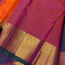 Sahana- Gorgeous Dual tone Manthulir Green with Rustic Orange Handwoven Pure Jari Kanjivaram Silk with beautiful buttas woven body rich mayilkan and chakram woven borders gorgeous pallu and contrast woven blouse