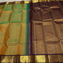 Sarasangi- Gorgeous Dual tone Green shot with mustard body with deep brown combination in a handwoven Pure Jari Korvai Kanjivaram Silk with beautiful borders rich pallu and contrast woven blouse