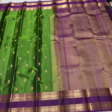 Sahana- Stunning Emerald Green with Dark Purple Buttas Handwoven Pure Kanjivaram Silk with beautiful doublepet borders rich pallu and contrast woven blouse