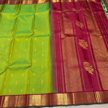 Vaibhogam- Gorgeous Parrot Green with Deep Red Handwoven Pure Jari Korvai Kanjivaram Silk with beautiful thilagam and mayil buttas woven body with beautiful borders rich parrot motifs woven beautiful pallu and contrast woven blouse