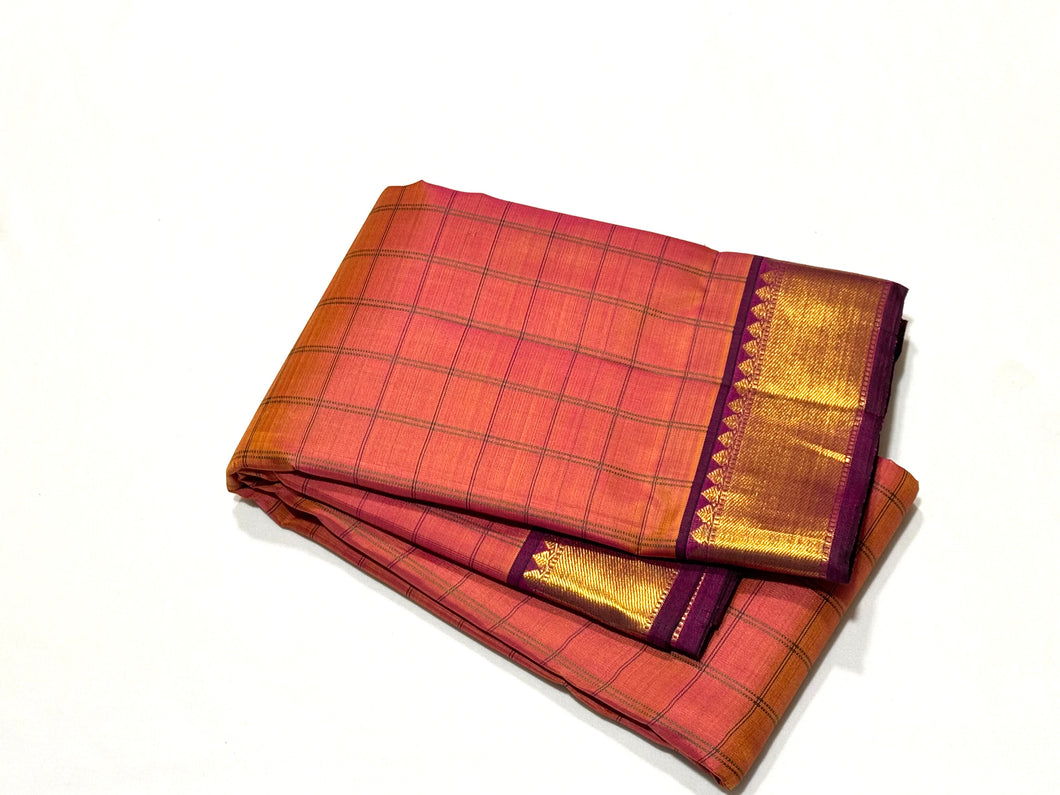 Double tone Orange mixed with deep magenta  Handwoven Pure Jari muthukattam woven Kanjivaram with rich borders pallu and contrast woven blouse beauty