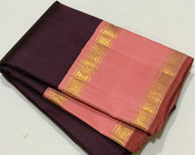 Sarasangi- Stunning Beetlenut Brown with Peachish Pink Handwoven Pure Jari Korvai Kanjivaram Silk with Classic Doublepet borders rich pallu and contrast woven blouse