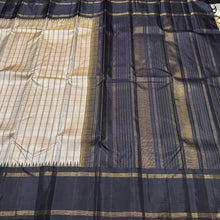 Khakhi Beige with Kanchana Black Handwoven Pure Jari Korvai Checked Kanchipuram Silk Saree with Rettapet borders Seer Pallu and contrast woven blouse beauty