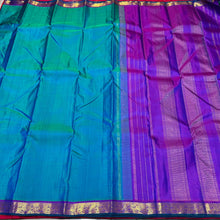 Nayaki- Peacock Blue Green with Purple Handwoven Pure Kanjivaram Silk with Small borders classic seer pallu and contrasting blouse