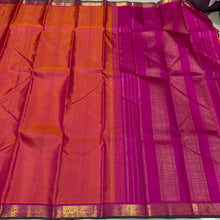 Nayaki- Gorgeous Orange with Pink Handwoven Pure Jari Kanjivaram Silknwith Green selvedges beautiful rich seer pallu and contrast woven pink blouse