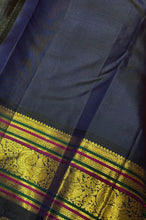 Vaibhogam -Strikingly Beautiful Orange with Deep kanchana Blue Kai Korvai Handwoven Pure Jari with Silk Buttas Pure Kanjivaram Silk with rich Meenakari Work Woven Borders gorgeous pallu and contrast woven blouse