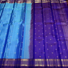 Sahana-Gorgeous Light  Blue with Deep Purplish Blue Buttas Handwoven pure Kanjivaram Silk wirh beautiful  borders rich pallu and contrast woven blouse