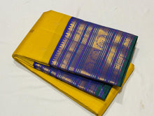 Vaibhogam- Stunning Yellow with Royal Blue Handwoven Pure Zari Korvai Kanjivaram Silk with Buttas Rich Varisaipet Borders gorgeous Meenakari work Pallu and Contrast woven blouse