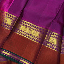 Sahana- Deep Maroonish Brown with Dark Magenta Muthukattam Handwoven Pure Jari Kanjivaram Silk with spaced borders in magenta rust and green with rich pallu and contrast woven blouse