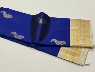 Vintage Inspired- Stunning Royal Blue with Ivory White With Peacock Body Silver Jari Buttas with rich varisaipet borders Handwoven Kaikorvai Kanjivaram Silk Saree with Rich Pallu and Contrast woven blouse beauty