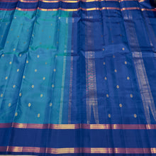 Sahana- Beautiful Blue with dark teal blue combination in a handwoven pure Jari Kanjivaram Silk with buttas woven body with rich borders beautiful pallu and contrast woven blouse