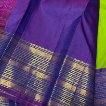 Vaibhogam- Mesmerizing Parrot Green with Violetish Purple Handwoven Pure Jari Korvai Kanjivaram Silk with Pattu buttas woven body with rich borders gorgeous pallu and contrast woven blouse