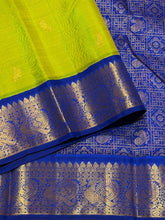 Vaibhogam- Stunning Parrot Green with MS Blue Handwoven Pure Jari Korvai Kanjivaram Silk with Bird buttas woven body with rich borders pallu and contrast woven blouse