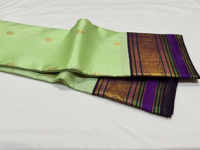 Pista Green with Deep Navy Blue Pure Jari Korvai with Buttas and Rich Borders Handwoven Kanjivaram Silk Saree Beauty