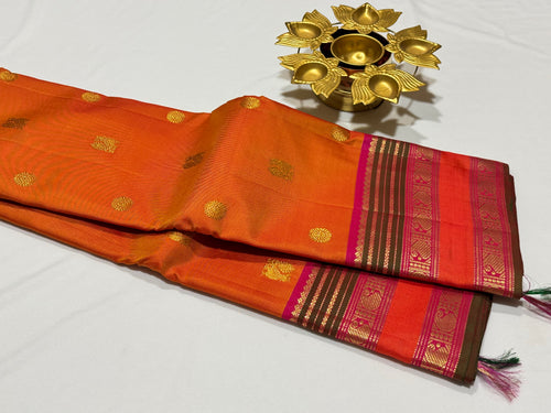 Mango Orange with Rani Pink Buttas with rettapet borders Handwoven Pure Jari Kanjivaram Silk Saree Beauty