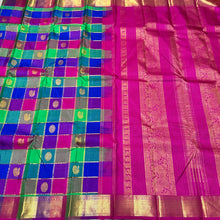 Multichecks with Buttas Rainbow Palum Pazhamum Checks with Mayil Chakram Buttas rich borders gorgeous Pink Pallu and Jari Striped Blouse Beauty