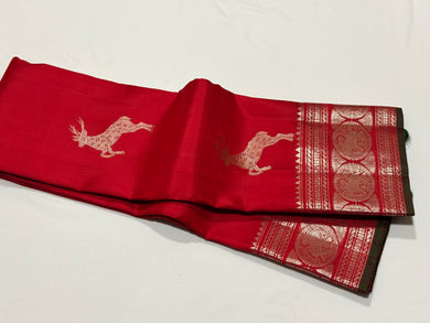Red with Silver Jari Handwoven Pure Kanjivaram Silk Saree with Green Selvedges with Deer motifs woven all over the body with rich borders pallu and self colored blouse