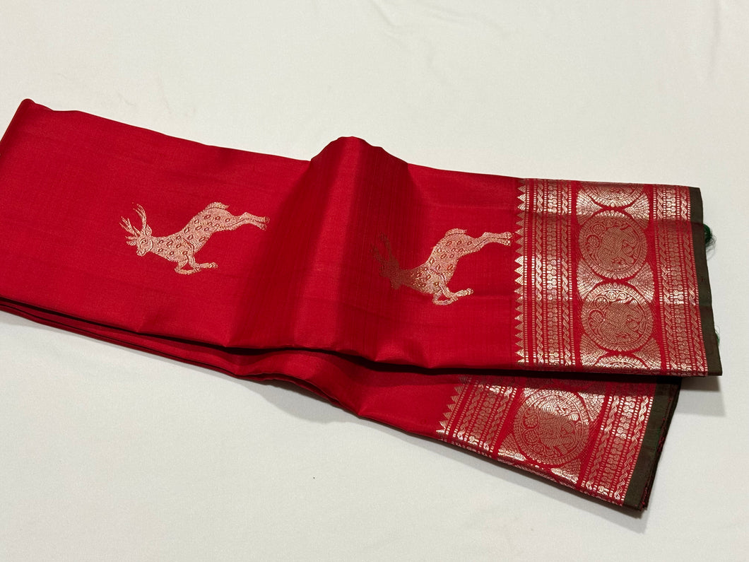 Red with Silver Jari Handwoven Pure Kanjivaram Silk Saree with Green Selvedges with Deer motifs woven all over the body with rich borders pallu and self colored blouse