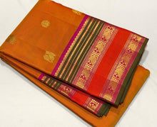 Sahana- Super Gorgeous Beautiful Simha Color (dual tone orange shot mustard shade) with Rich Pink Handwoven Pure Kanjivaram Silk with Mayil Chakram Buttas woven body with beautiful borders rich pallu and contrast woven blouse