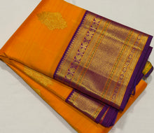 Vaibhogam- Gorgeous Mambazham Yellow with Purple Handwoven Pure Jari Korvai Kanjivaram Silk With Buttas woven body with Long and Short beautiful rich borders pallu and contrast woven blouse
