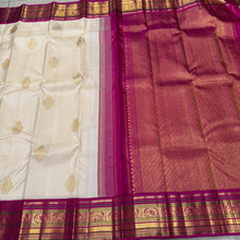 Vaibhogam-Mindblowing Offwhite with Pink Handwoven Pure Jari Korvai Kanjivaram Silk Saree with rich Buttas Woven Body with intricate Meenakari Work Borders Gorgeous Pallu and Contrast woven blouse