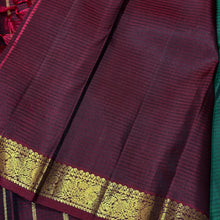 Vaibhogam- Gorgeous Bottle Green with Deep Maroon Handwoven Pure 2g Jari Korvai with Buttas Kanjivaram Silk with Self striped body with beautiful small borders rich pallu and contrast woven maroon blouse