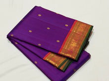 Sahana- Gorgeous Purple with Dual tone Orange Buttas Handwoven Pure Jari Kanjivaram Silk with small borders rich pallu and contrast woven beautiful blouse